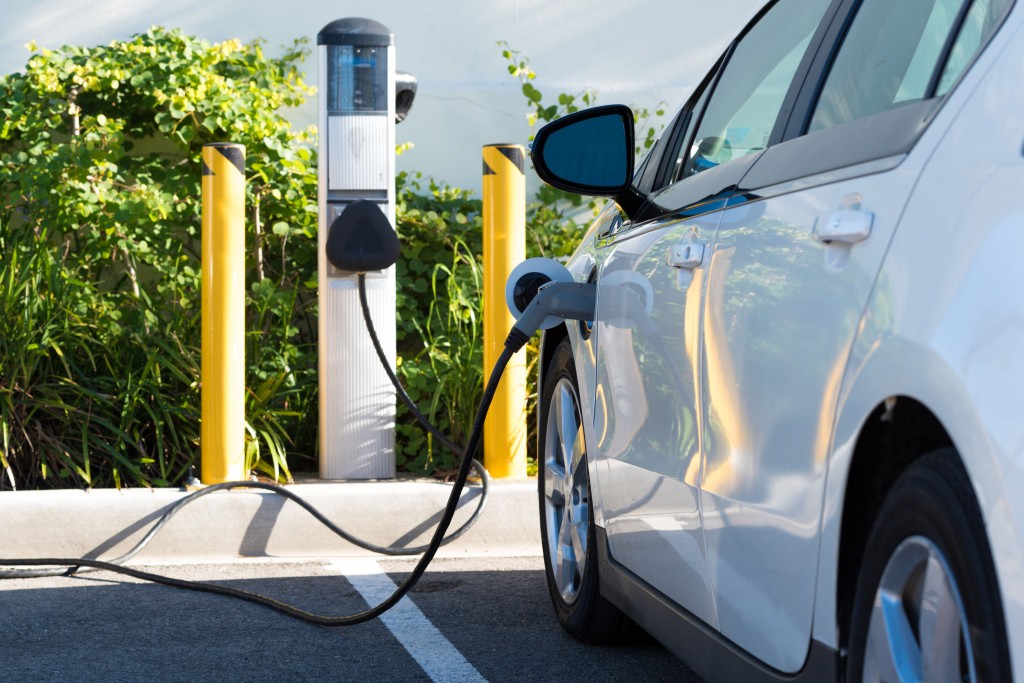 44662621 - an electric car charging in california